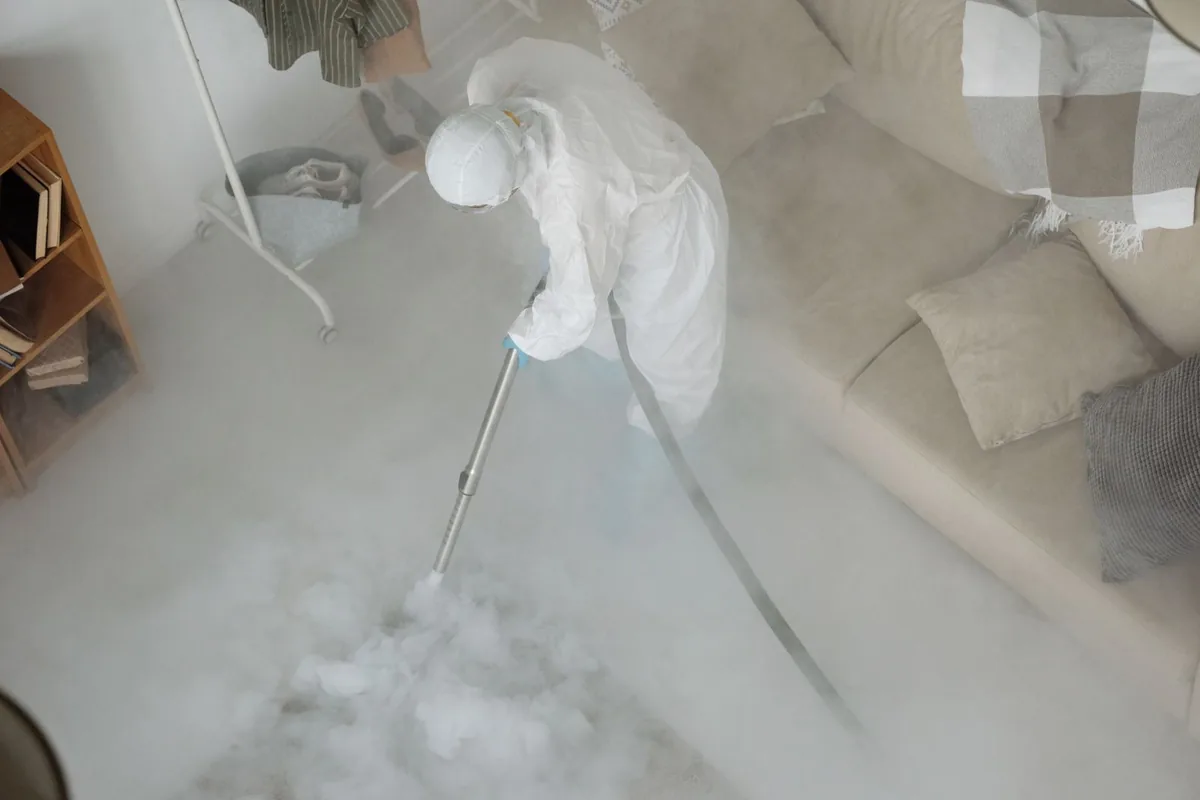 Biohazard cleanup technician in protective equipment, Duncansville, PA